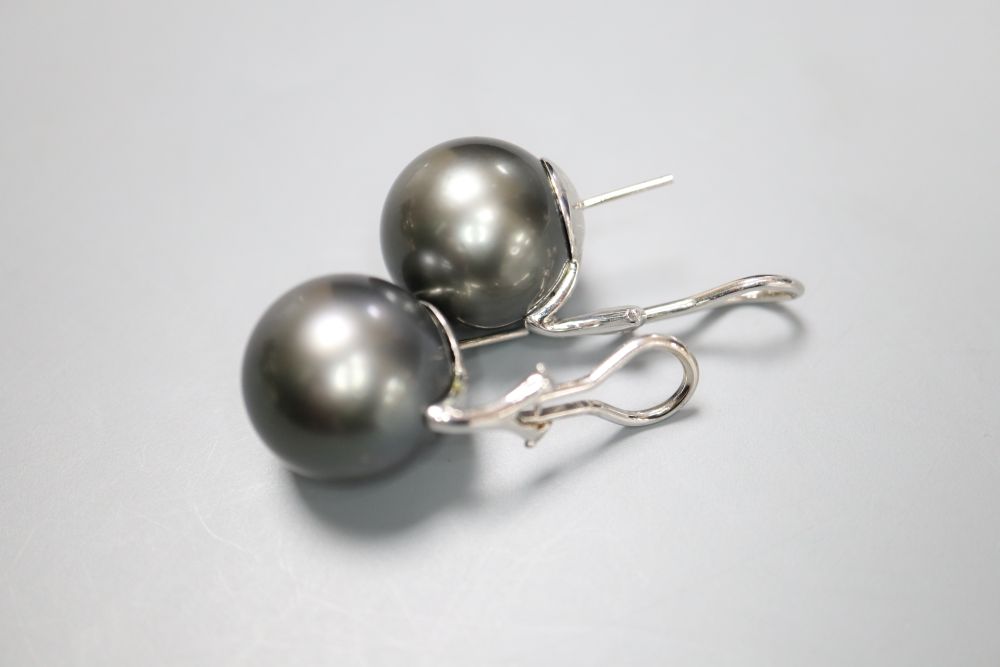 A large modern pair of white metal mounted grey freshwater pearl? earrings, diameter 15.6mm, gross 14.7 grams.